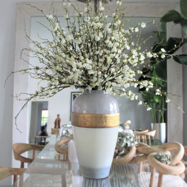 Goddess vase with cherry blossom branches